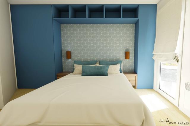 Proposition photoréaliste d&rsquo;une chambre avec rangements sur mesure bleus clair.