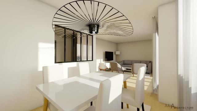 Salle à manger avec vue sur le salon et la jolie verrière qui la sépare de l’entrée. Salle à manger avec vue sur le salon et la jolie verrière qui la sépare de l’entrée.